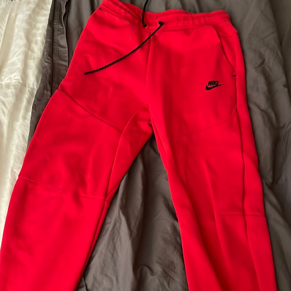 Red Nike Tech sweatsuit